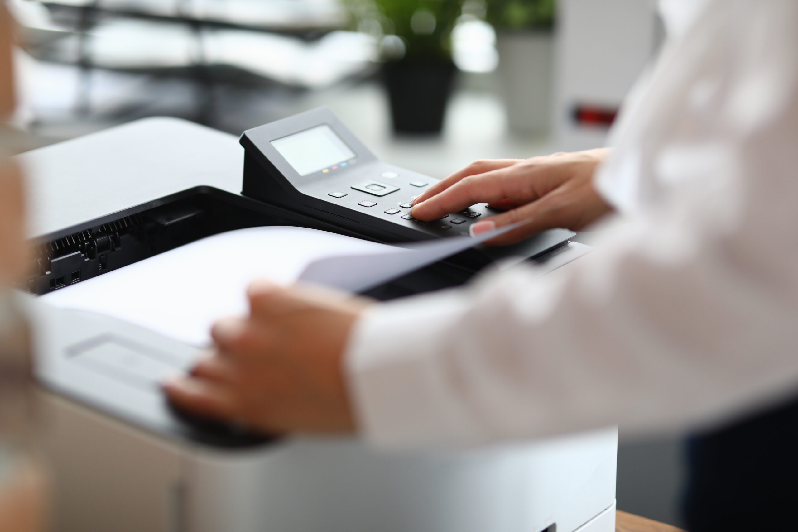 Office worker using printer